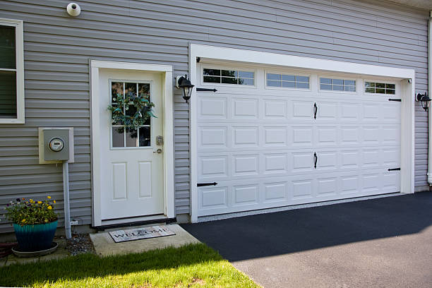24/7 Emergency Garage Door Panel Replacement experts in Wamego, KS